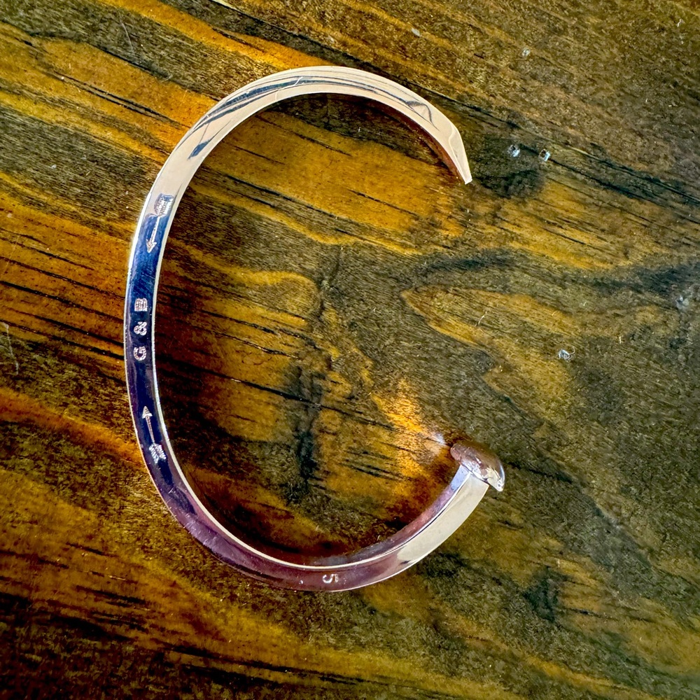 Giles and Brother nail cuff in rose gold.